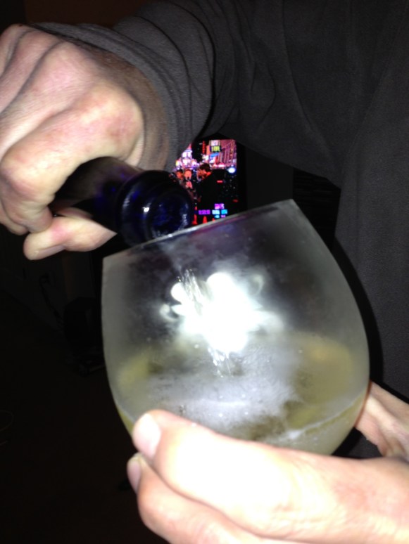 So this technically is sparkling wine, because it's from Spain, but it was cheap. And yes, that's not a champagne glass, but seriously, who has those?