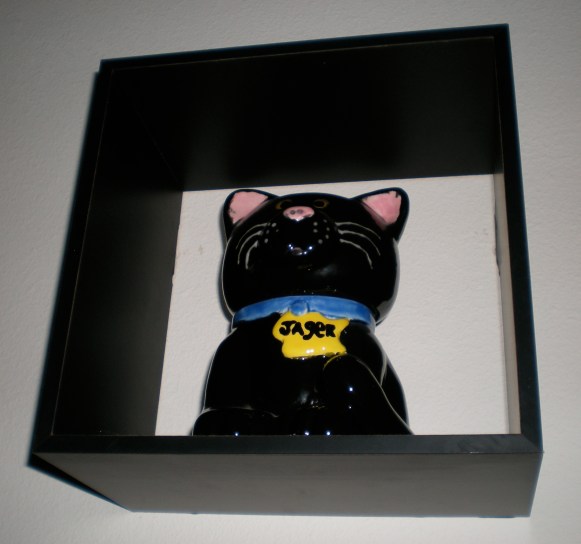 Some may find it weird that we have our dead kittens ashes in his treat jar displayed (up high, of course, where the live ones can't disrupt), but we don't own a yard we could have buried him in and it just didn't seem right any other way. 